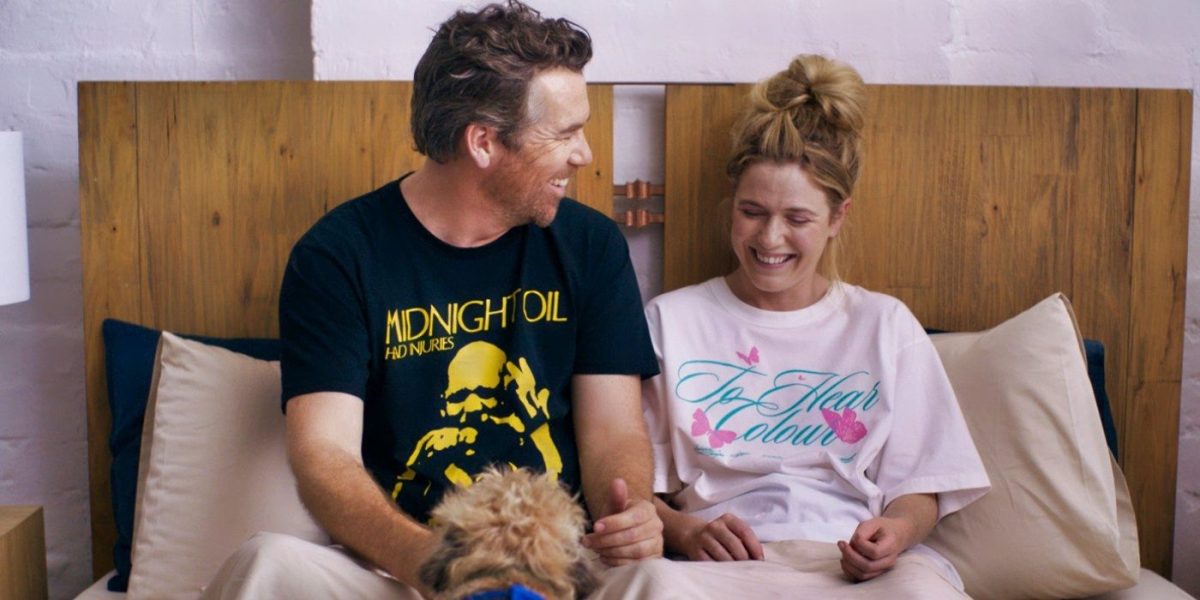 ‘Colin From Accounts’ Co-Creators Didn’t “Set Out To Make a Rom-Com”